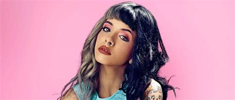 Analyzing Melanie Martinez's Unique Brand of Magical Charm: The Key to Her Success